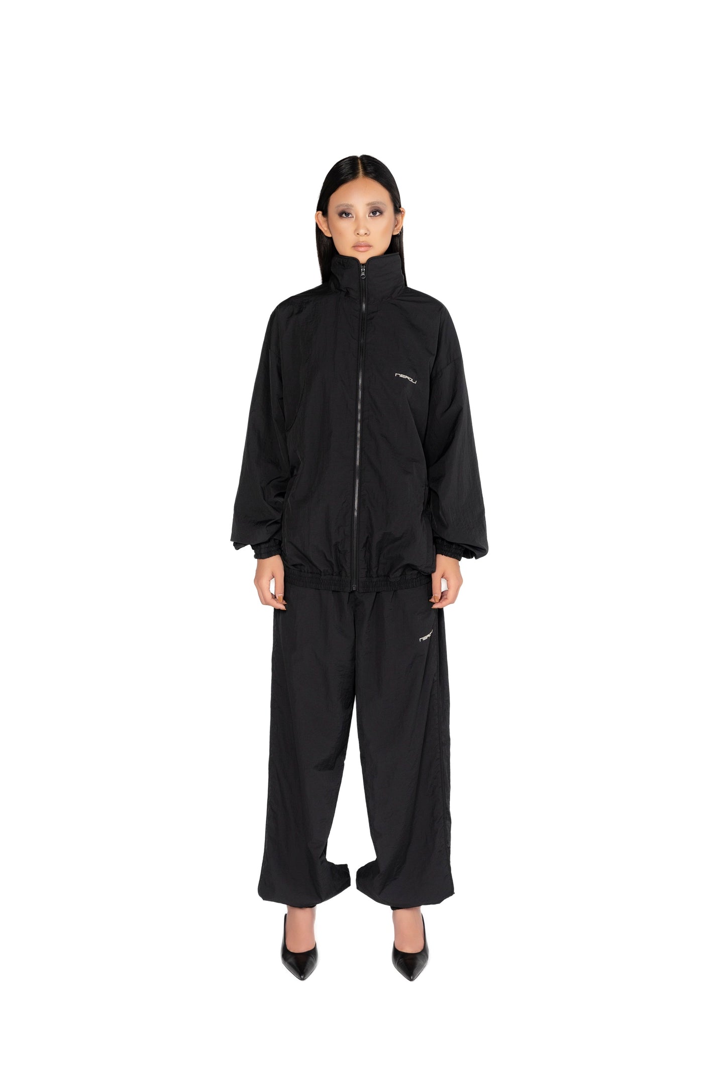 OVERSIZED TRACK PANTS.