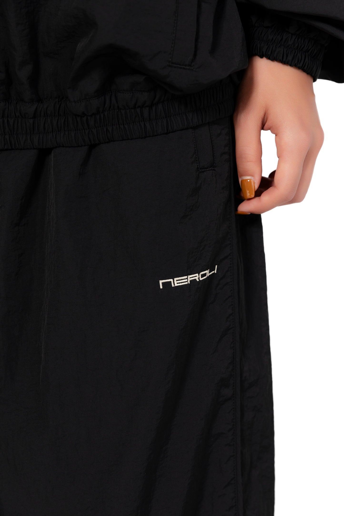 OVERSIZED TRACK PANTS.