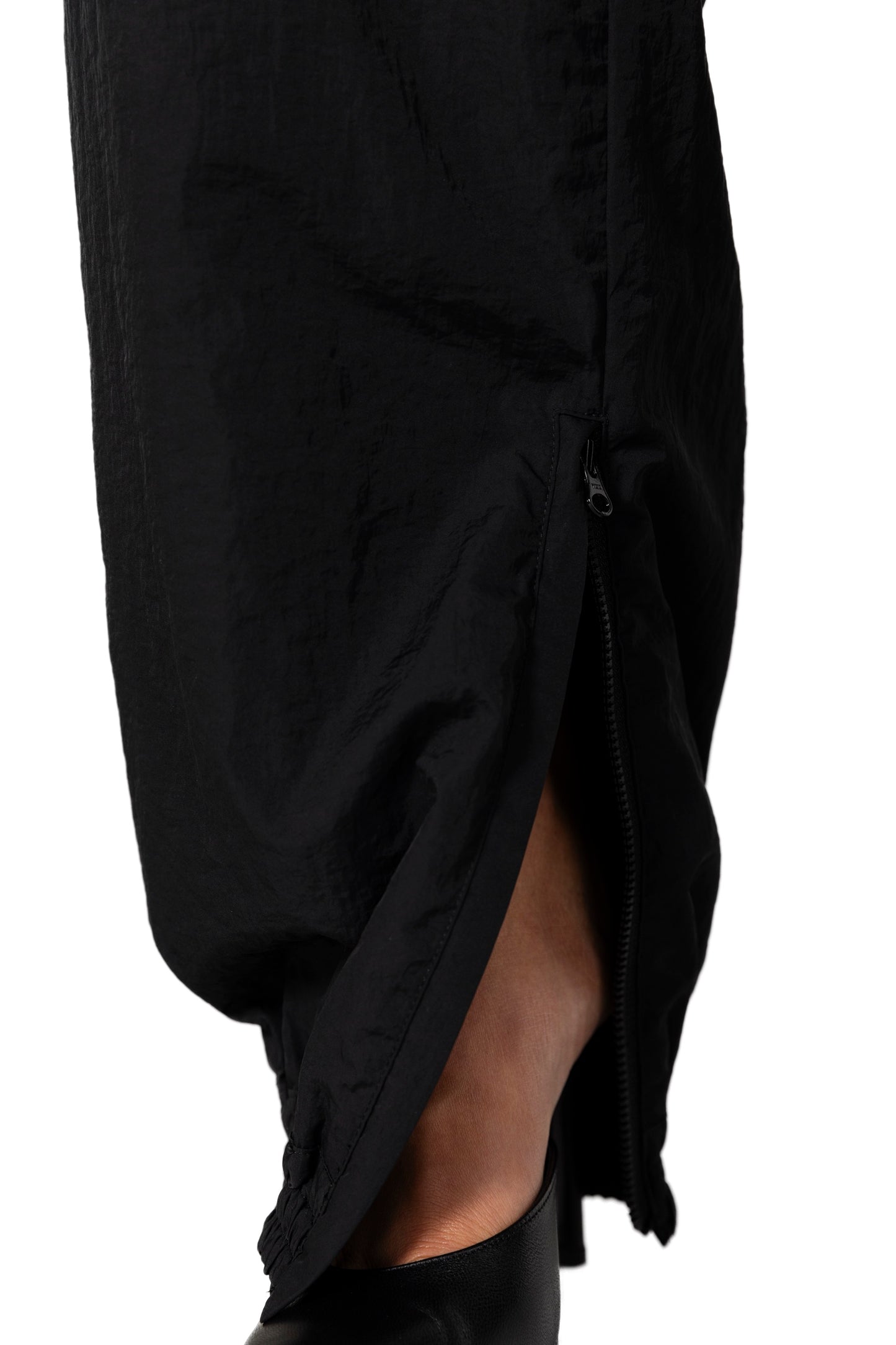 OVERSIZED TRACK PANTS.